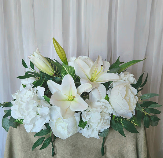 white lily headstone memorial arrangement